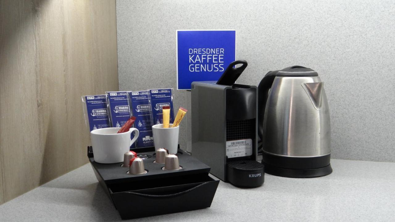 Aparthotel Residenz Am Zwinger Dresde Exterior foto A Nespresso coffee machine