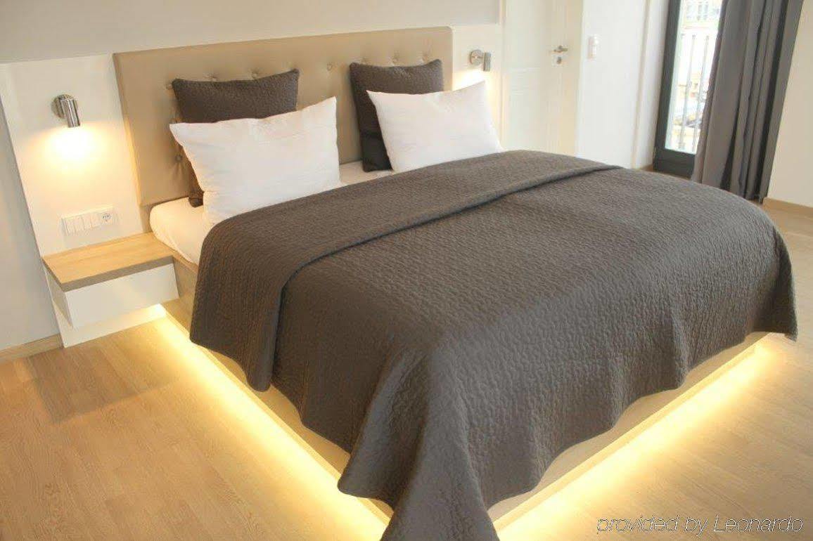 Aparthotel Residenz Am Zwinger Dresde Exterior foto A modern bedroom