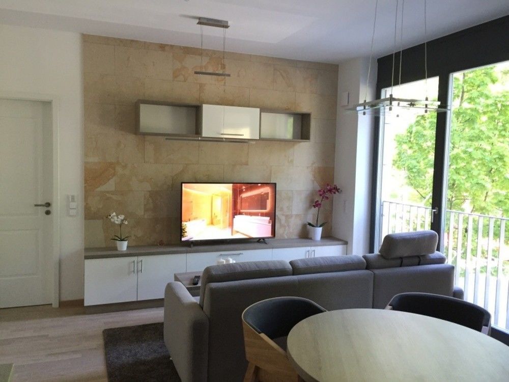 Aparthotel Residenz Am Zwinger Dresde Exterior foto A living room with a television